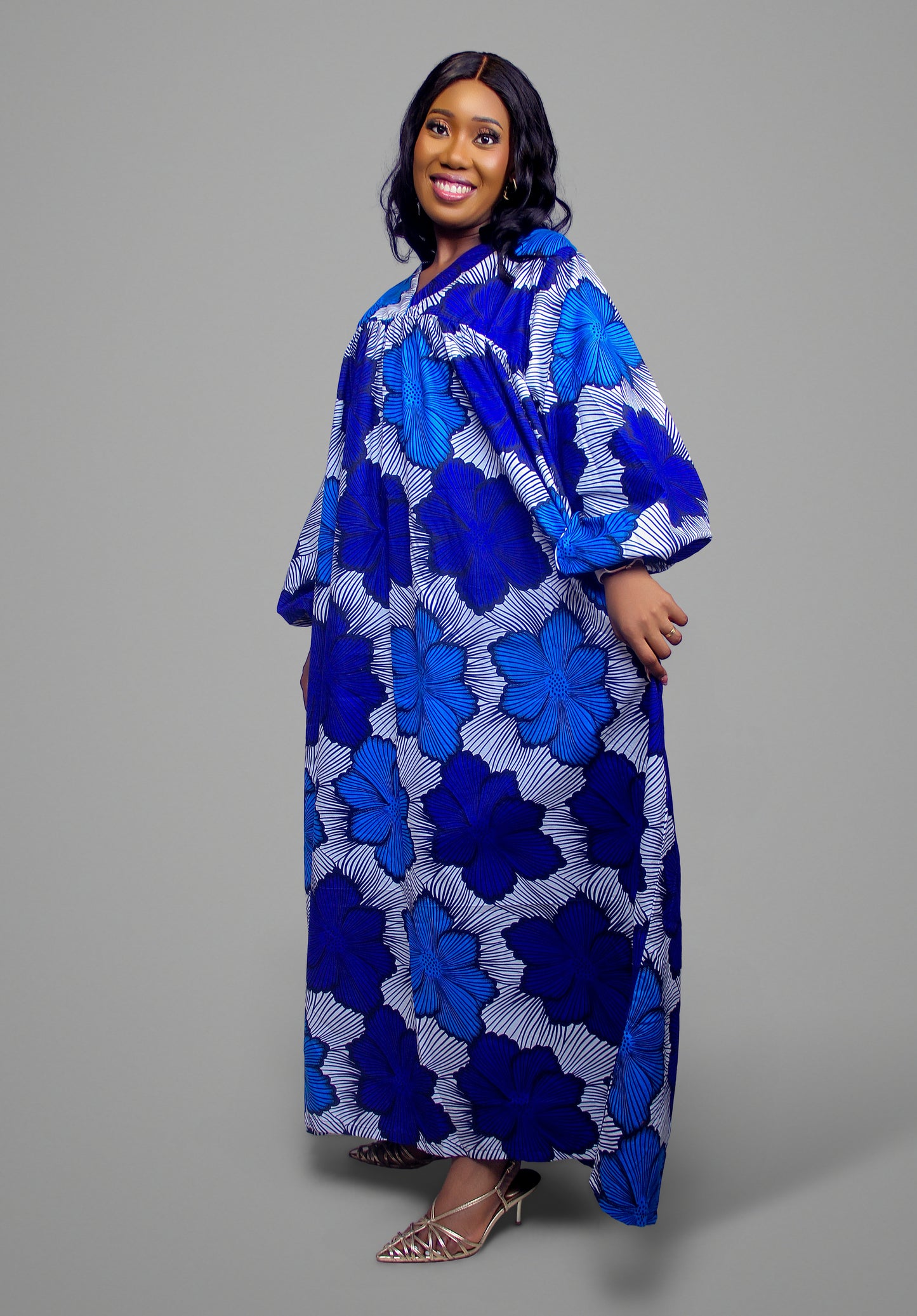 Long sleeve maxi kaftan in a bold blue and white floral-inspired African print