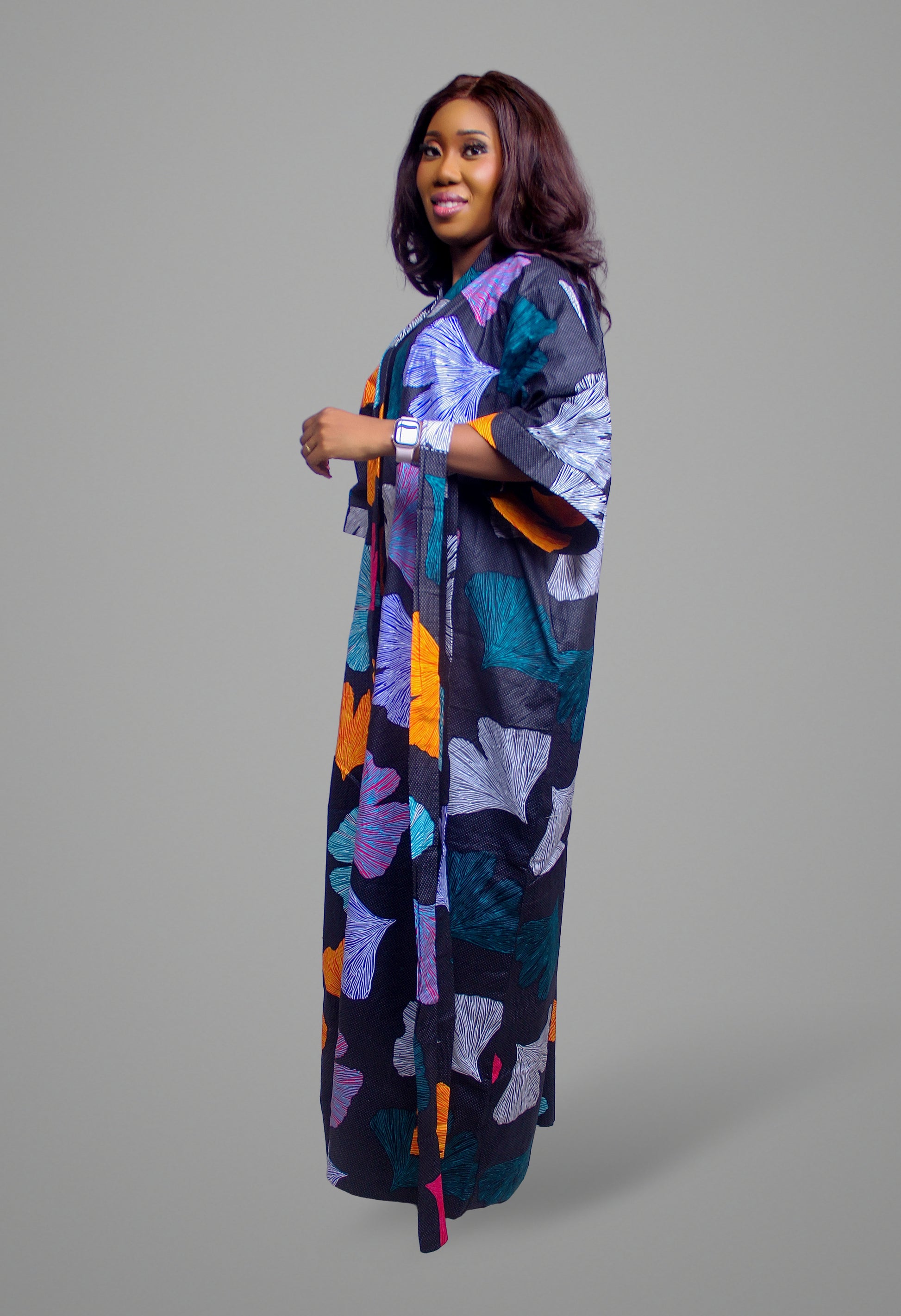 Side profile view of the long-sleeve ginkgo leaf print maxi kimono robe showing the full length