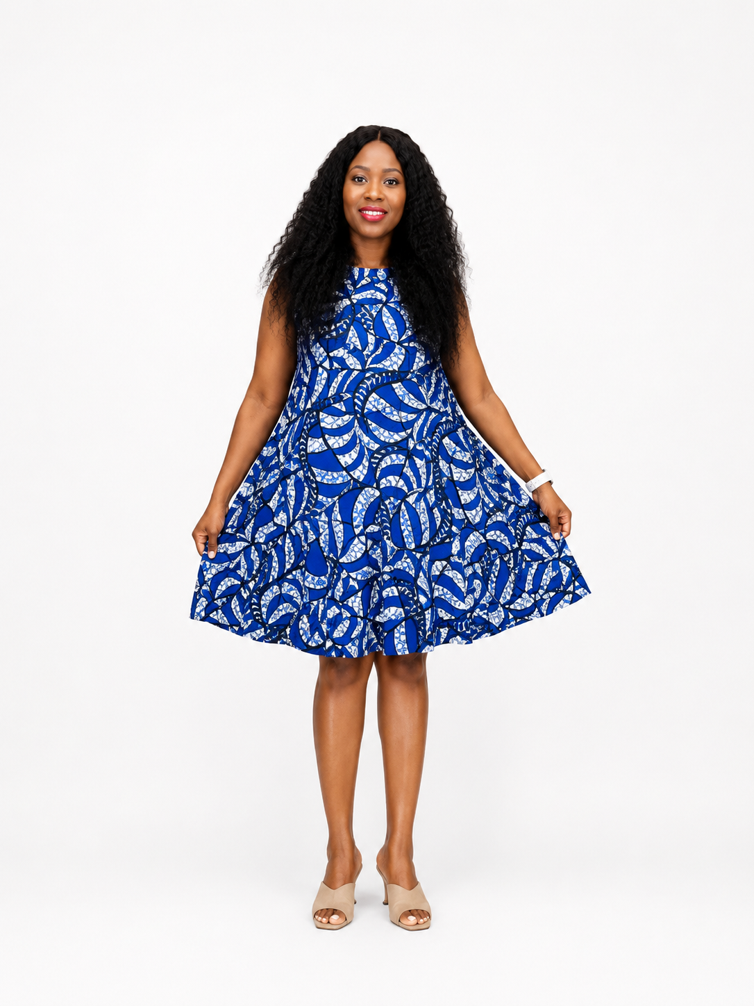 Front view of the blue and white graphic print shift dress shown at knee length