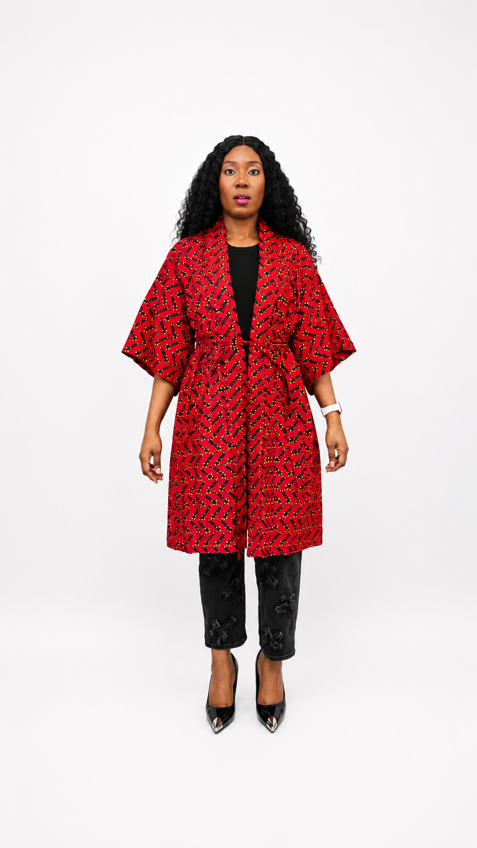 Front view of a vibrant red patterned cotton kimono jacket tied at the waist