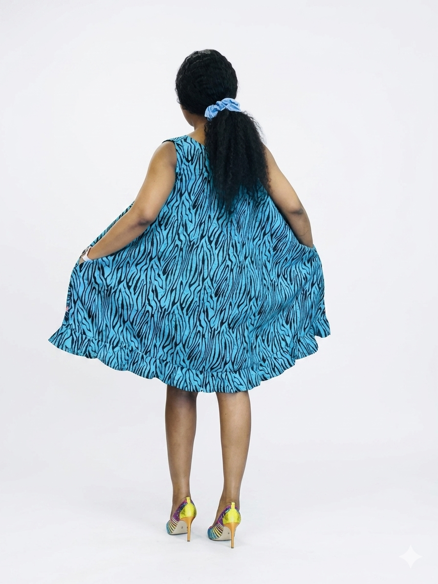 Back view of the blue and black zebra print tent dress showing the flared hem