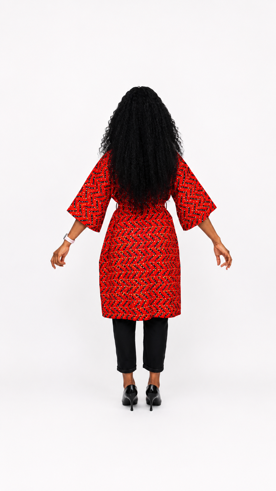 Back view of a red zigzag print cotton kimono jacket with a belted waist