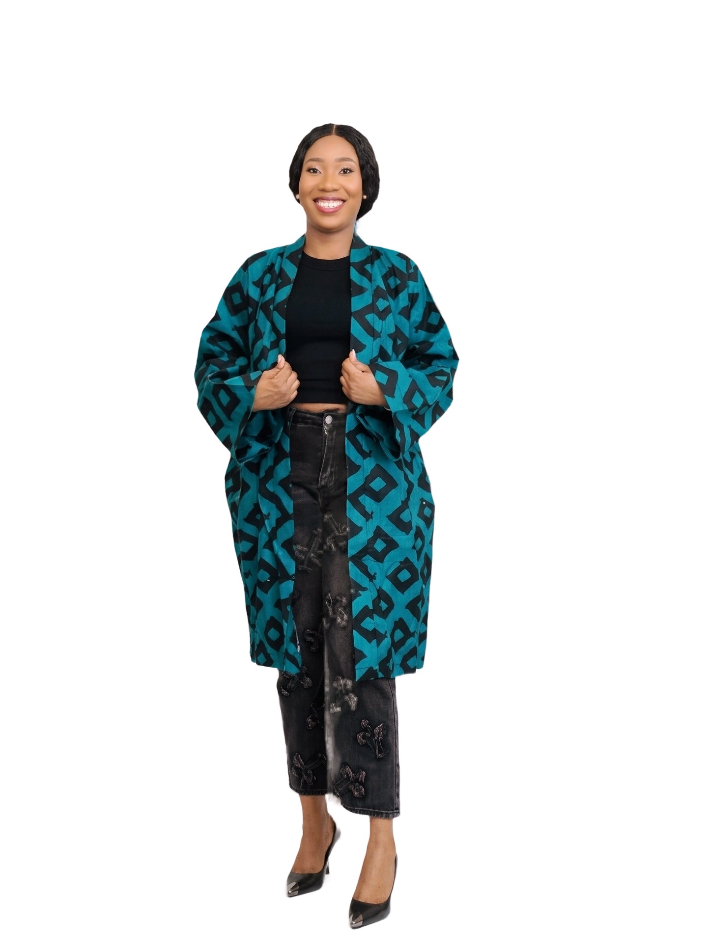 Front view of teal and black geometric print kimono jacket worn over black top and jeans