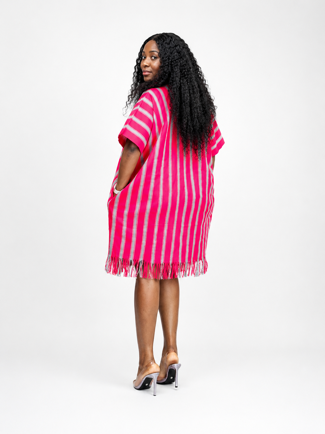 Back view of a pink kaftan dress featuring a relaxed silhouette
