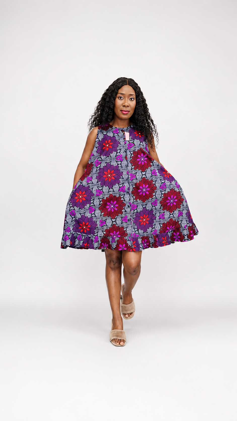 Front view of the purple and red floral shift dress demonstrating the loose, flowy fit