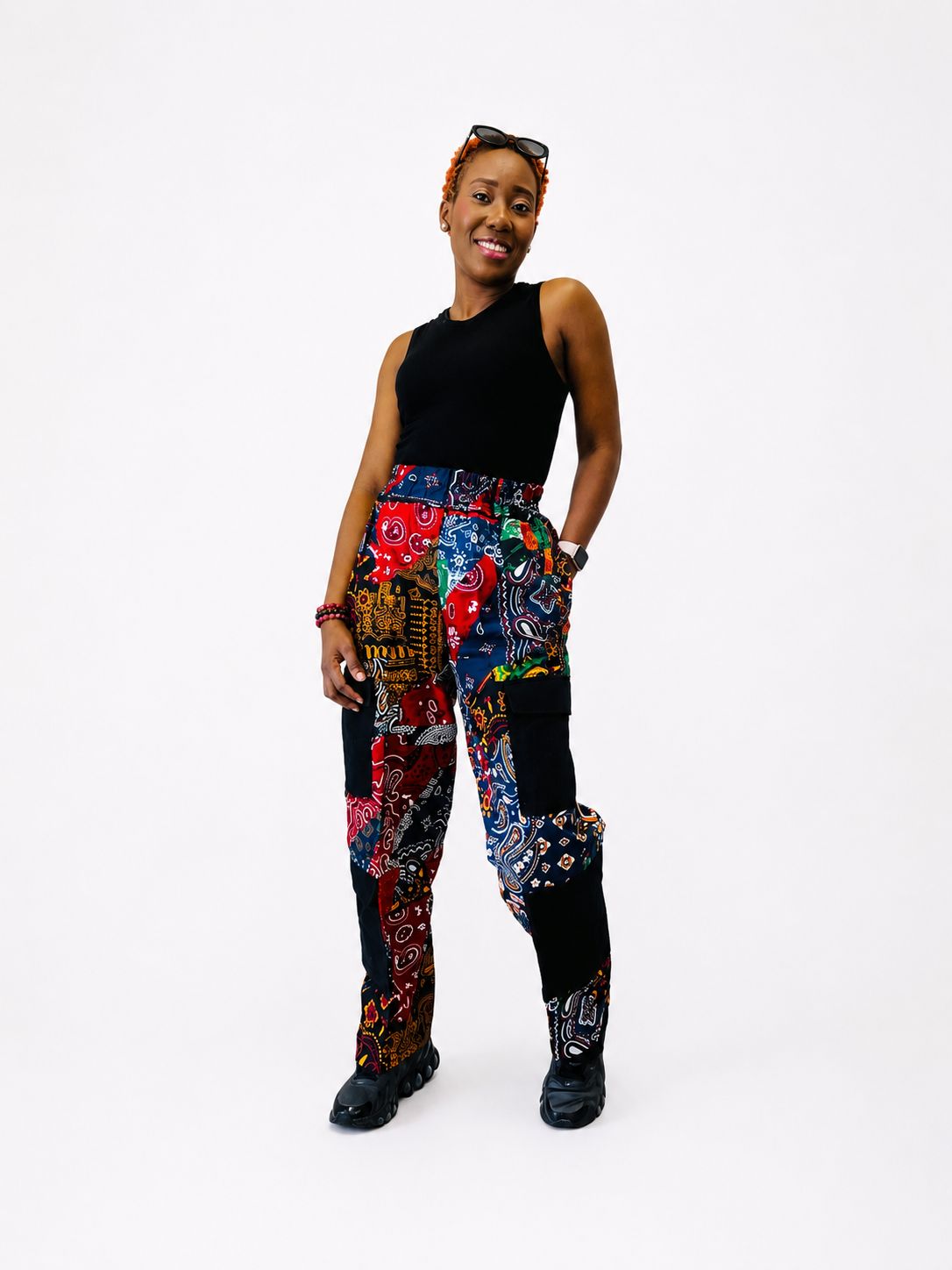Full-length shot showing the patterned cotton fabric and black cargo pocket details